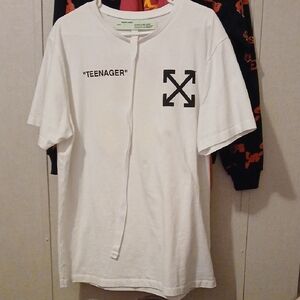 Off-White Graphic Tee with Black Design